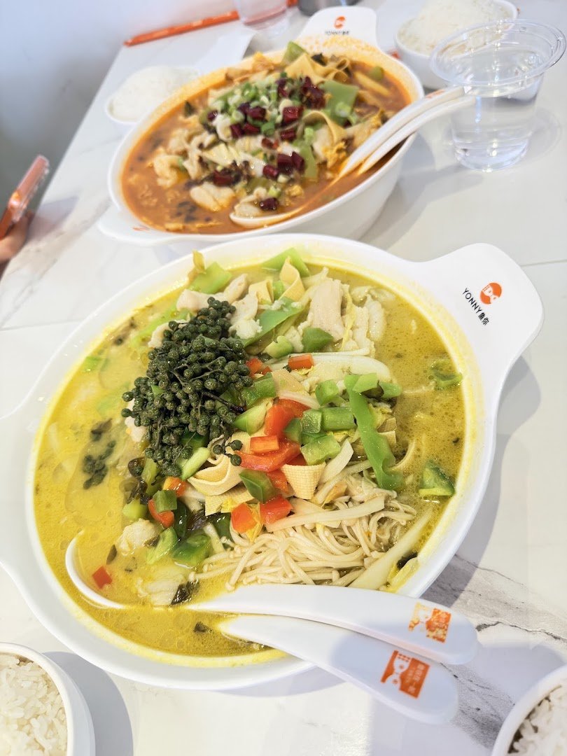 Chinese fast food dishes on a table.